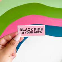 Load image into Gallery viewer, Black pink in your area sticker with a colorful background
