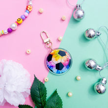 Load image into Gallery viewer, This is a Tie Dye Soccer Ball Keychain with a gold polished swivel clasp

