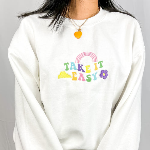 Colorful embroidered white sweatshirt