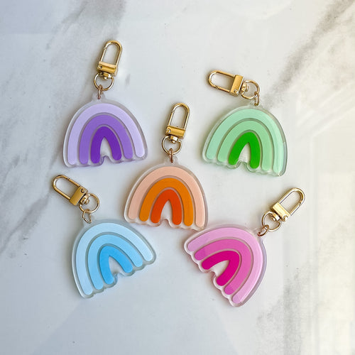 Rainbow acrylic keychains in multiple colorways