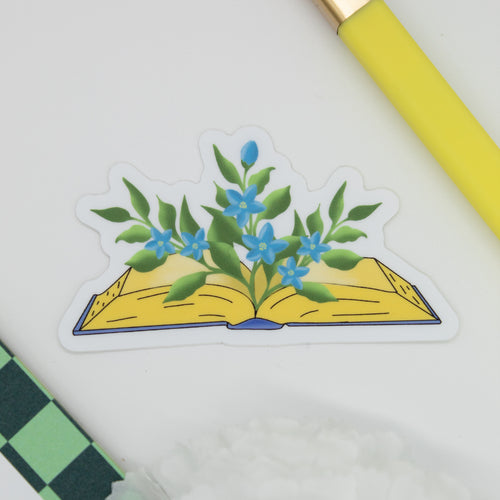 Yellow Book with Blue Flowers and Green Leaves Sticker