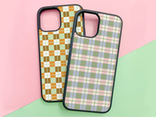 Load image into Gallery viewer, 2 plaid phonecases for iPhone or Samsung. On the left in the popcorn color and on the right in the strawberry matcha color
